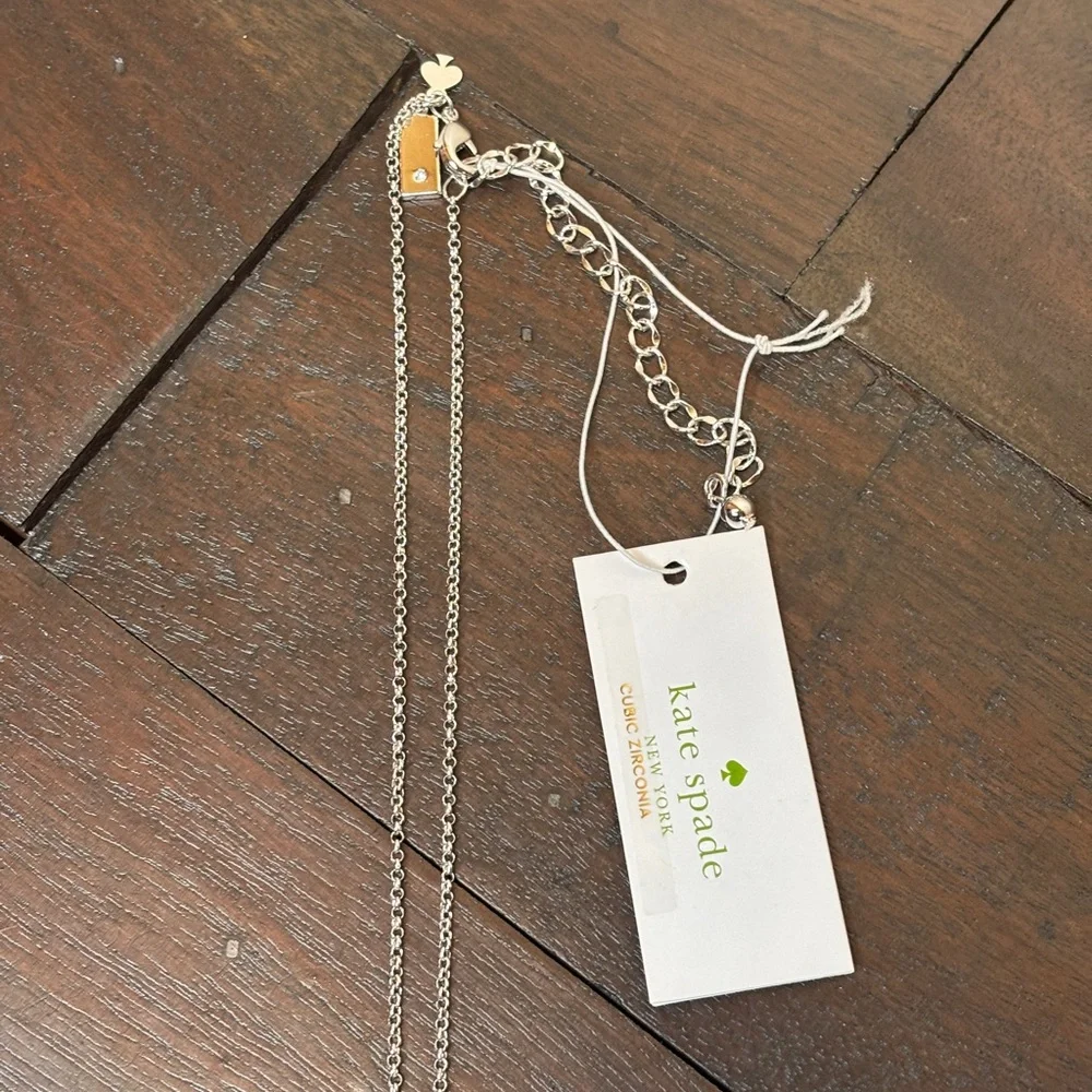 Kate Spade Full Circle Necklace Silver Colored with Clear Stones New with pouch‎
